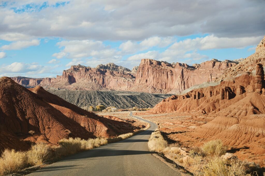 Discover the red rock landscapes and stunning views of Capitol Reef National Park in Utah.