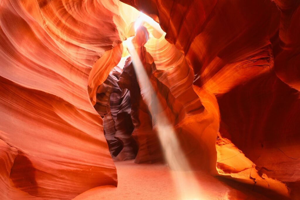 pexels-photo-11026416-11026416 Stunning light ray illuminating the red rock formations of Antelope Canyon in Arizona.