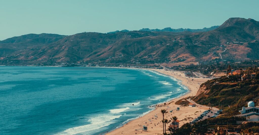 pexels-photo-12422179-12422179 Captivating high angle view of Malibu's coastline, featuring beach, mountains, and ocean.