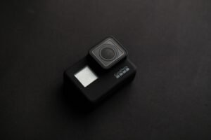 pexels-photo-2294897-2294897 High-quality image of a GoPro camera on a dark surface, ideal for tech content.