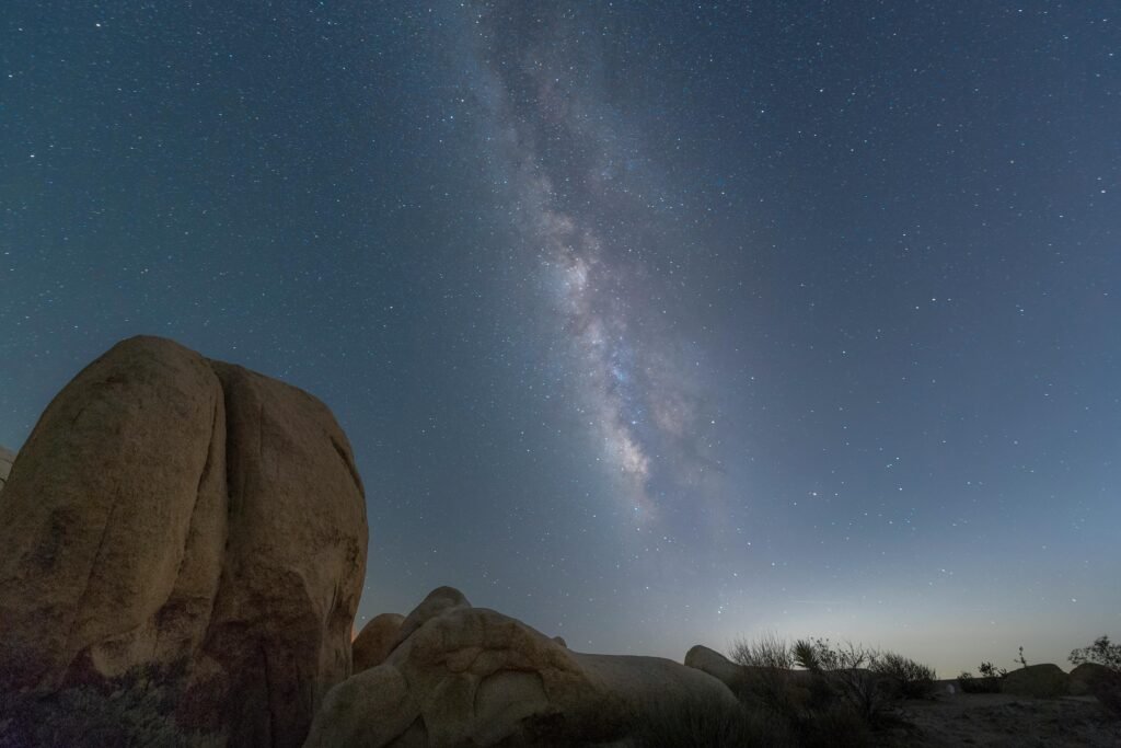 pexels-photo-5348709-5348709 A mesmerizing night view of the Milky Way spanning over rugged rocks in the California desert.
