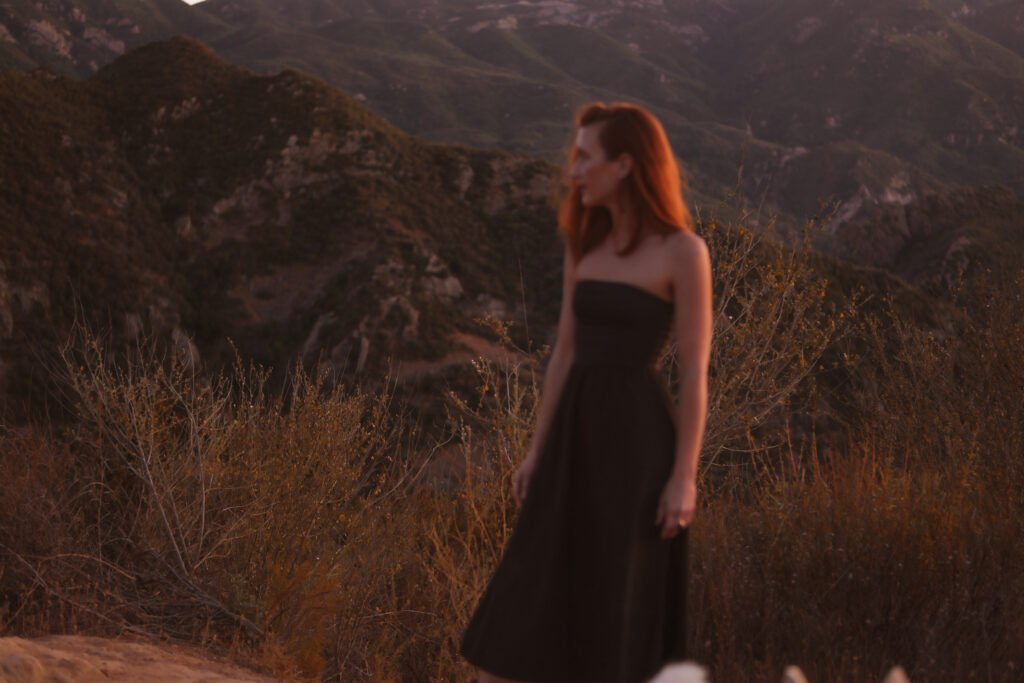 Chelsea hiking in the Calabasas mountains during sunset in Los Angeles, CA